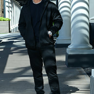 Men’s black Midnight Motion sweatsuit with zip hoodie and tapered joggers, full body front view
