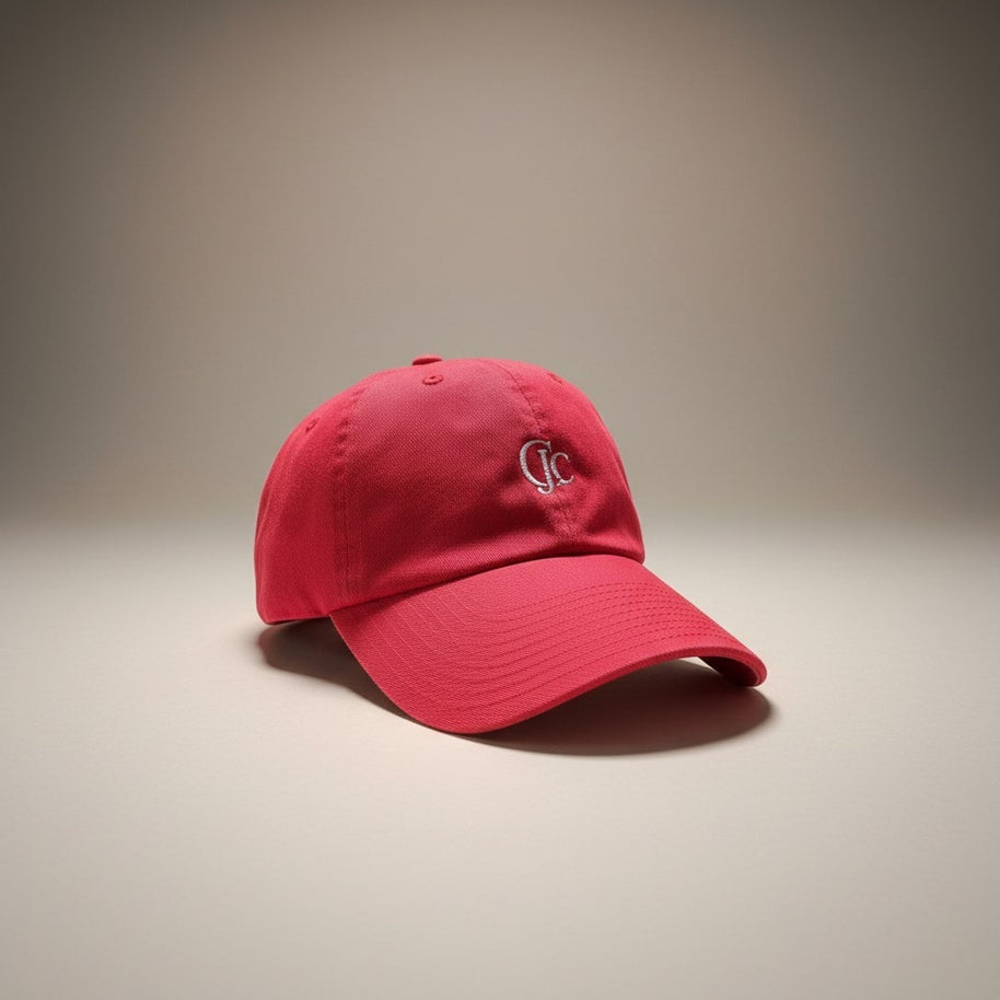 Front view of the CianniJ's CJC Red Twill Hat featuring an embroidered CJC monogram, structured crown, and adjustable buckle closure.
