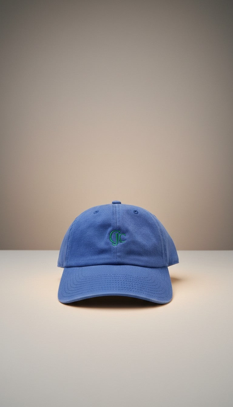 Front view of the CianniJ's CJC Royal Blue Twill Hat featuring an embroidered CJC monogram, structured crown, and adjustable buckle closure.