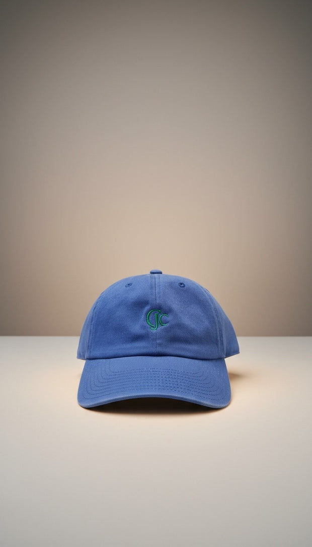 Front view of the CianniJ's CJC Royal Blue Twill Hat featuring an embroidered CJC monogram, structured crown, and adjustable buckle closure.