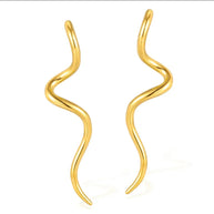 Flow Gold Sculptural Earrings, on white background, showcasing the fluid open silhouette and polished gold 