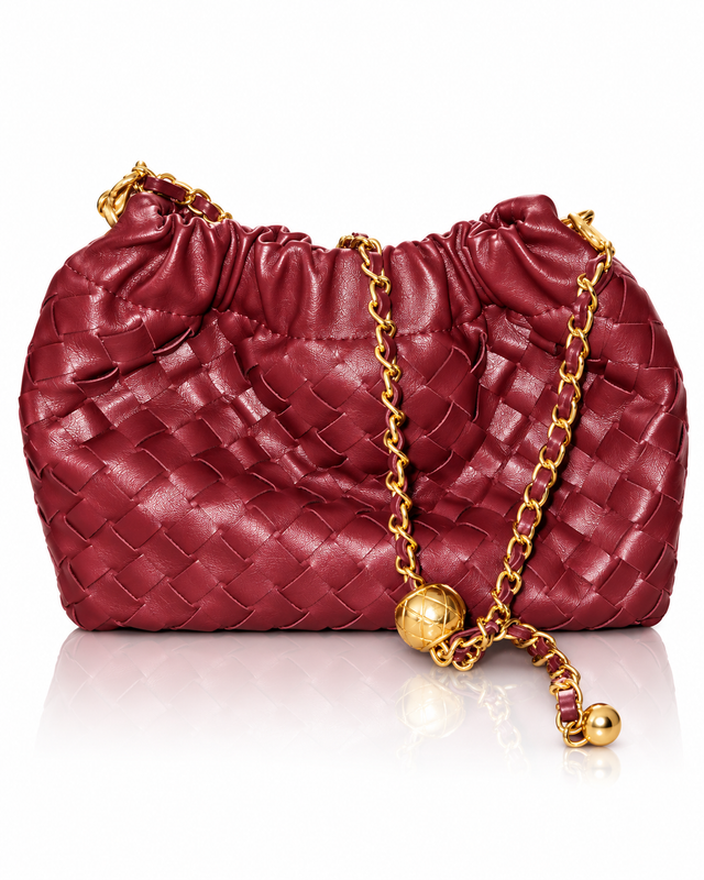 Rouge red woven shoulder bag with gathered detailing and gold-tone chain accents, front view.